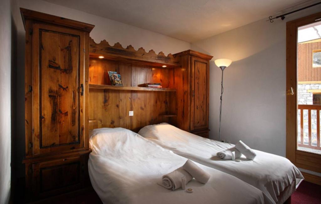 Slide un exemple de chambre avec 2 lits simples